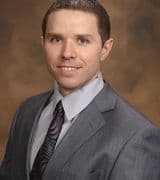 Adam J Mutschelknaus